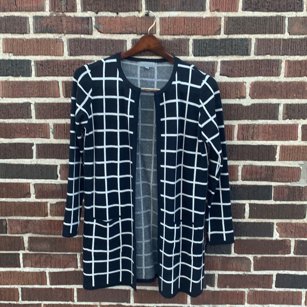 Black and white checkered cardigan.